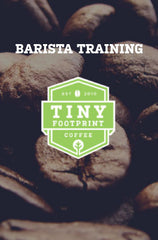 Barista training image with coffee bean background with Tiny Footprint Logo over it